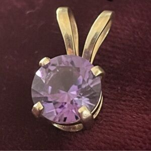 Gorgeous 14k Gold and amethyst Purple Pendant! Stamped ! Measures 8mm L x 4mm.